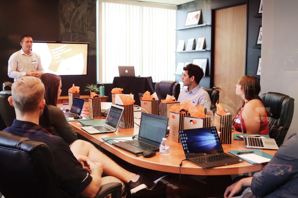 Office workers around a desk